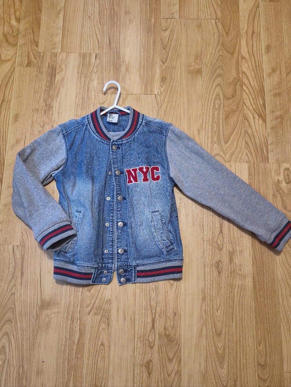 H&M Light Blue Denim Bomber Jacket with Gray Knit Sleeves and Red NYC Patch